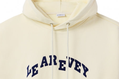 LE AREVEY ARCH LOGO HOODIE IVORY